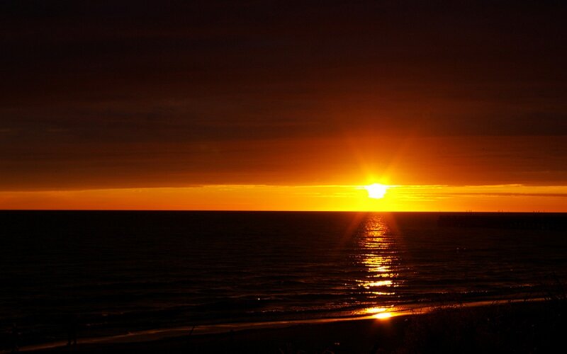Sun Setting over Ocean — Orange, Dramatic, Sunset, Photograph, Sky, Beach