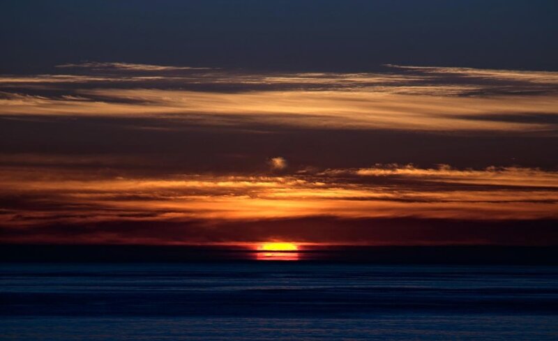 Sun Setting over Ocean — Orange, Dramatic, Sunset, Photograph, Sky, Clouds