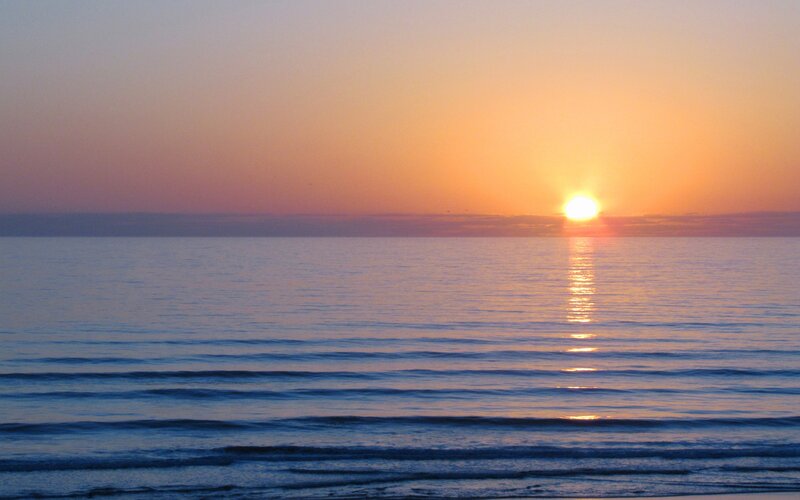 Sun Setting over Ocean — Orange, Purple