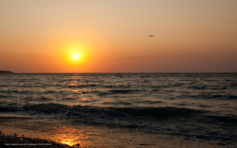 Sun Setting over Ocean — Orange, Serene, Sunset, Photograph, Airplane