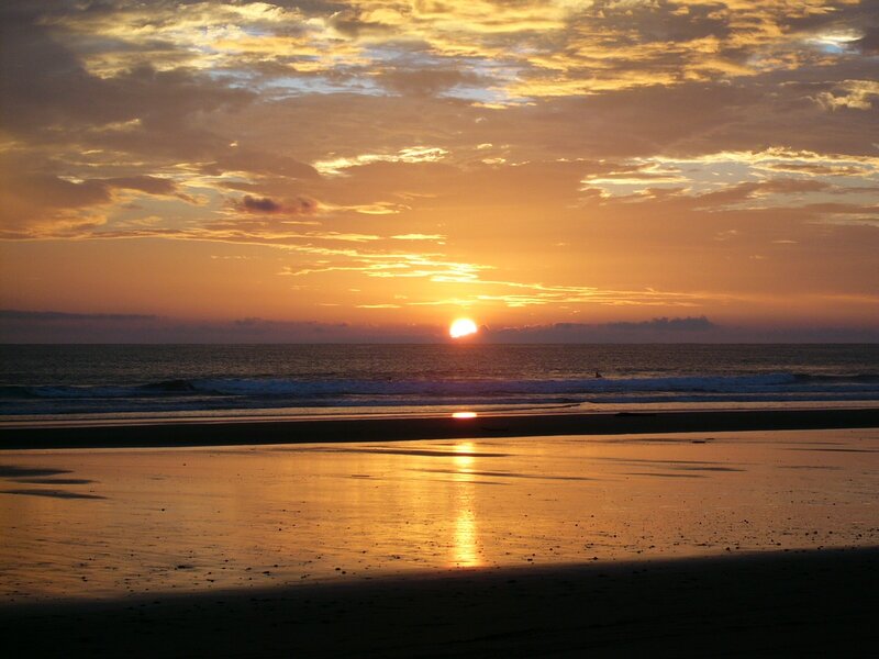 Sun Setting over Ocean — Orange, Serene, Sunset, Photograph, Beach, Waves, Clouds, Yellow, Brown