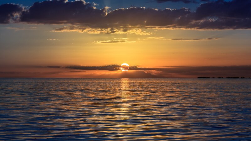 Sun Setting over Ocean — Orange, Serene, Sunset, Photograph, Clouds, Horizon, Reflection