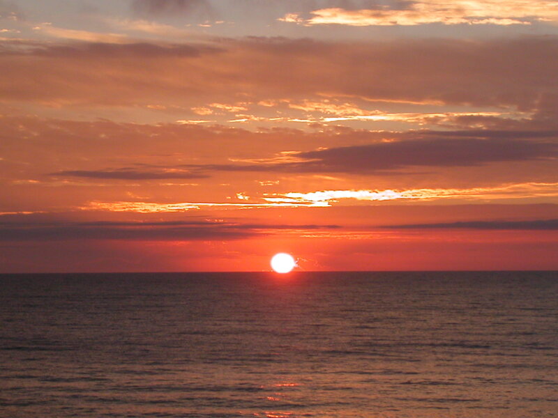 Sun Setting over Ocean — Orange, Serene, Sunset, Photograph, Clouds, Red, Dark Blue