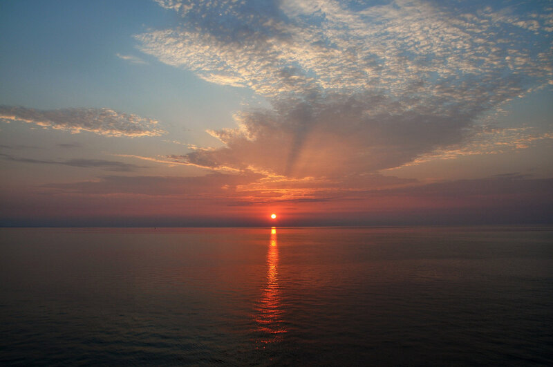 Sun Setting over Ocean — Orange, Serene, Sunset, Photograph, Clouds, Reflection, Blue
