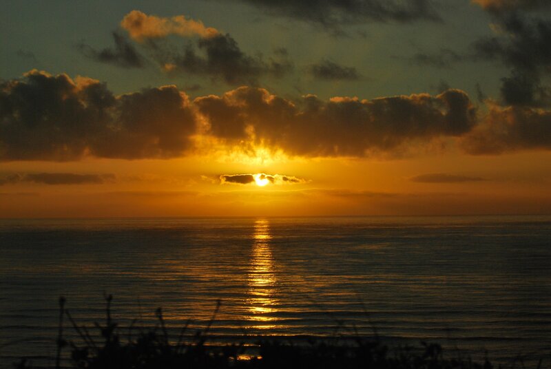 Sun Setting over Ocean — Orange, Serene, Sunset, Photograph, Clouds, Sea, Sky, Yellow, Dark Blue