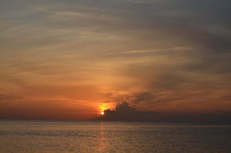 Sun Setting over Ocean — Orange, Serene, Sunset, Photograph, Clouds, Sky, Water