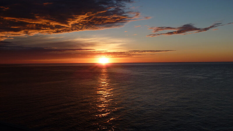 Sun Setting over Ocean — Orange, Serene, Sunset, Photograph, Clouds
