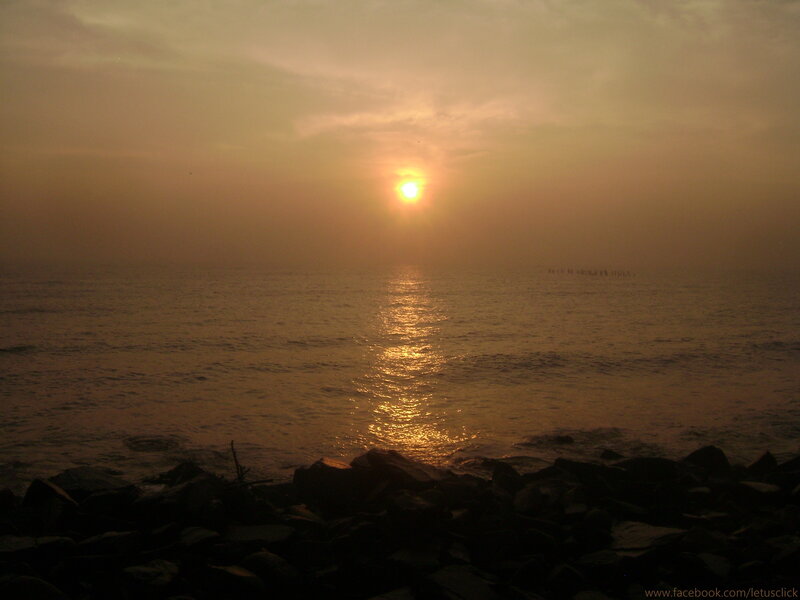 Sun Setting over Ocean — Orange, Serene, Sunset, Photograph, Rocks, Sky