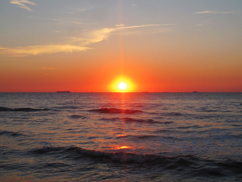 Sun Setting over Ocean — Orange, Serene, Sunset, Photograph, Ships