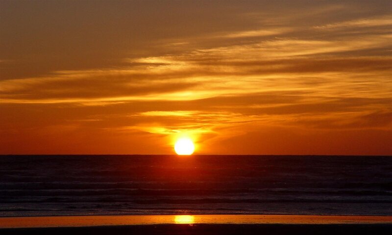 Sun Setting over Ocean — Orange, Serene, Sunset, Photograph, Sky, Clouds, Beach