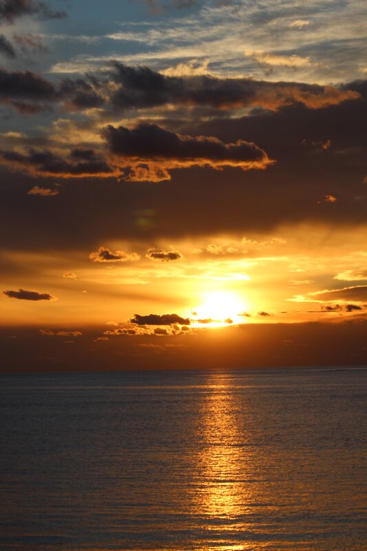 Sun Setting over Ocean — Orange, Serene, Sunset, Photograph, Sky, Clouds, Water