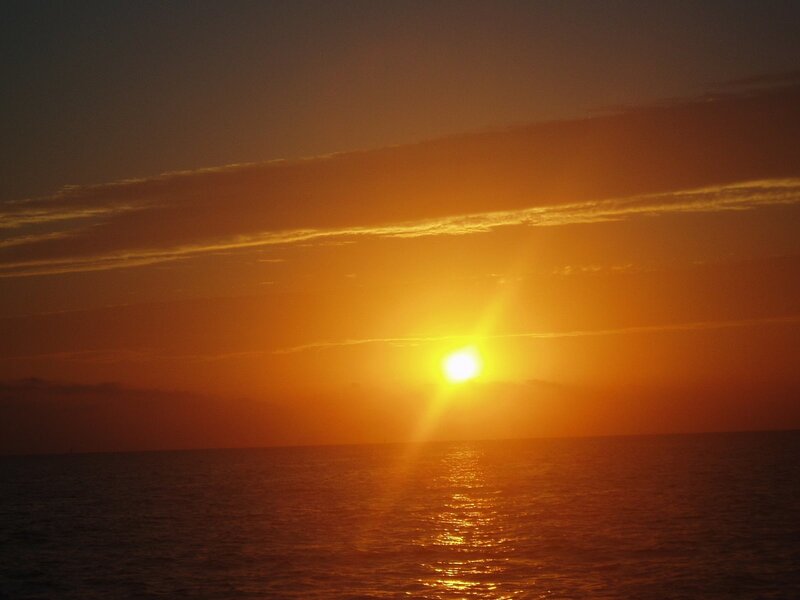 Sun Setting over Ocean — Orange, Serene, Sunset, Photograph, Sky, Clouds, Water, Yellow
