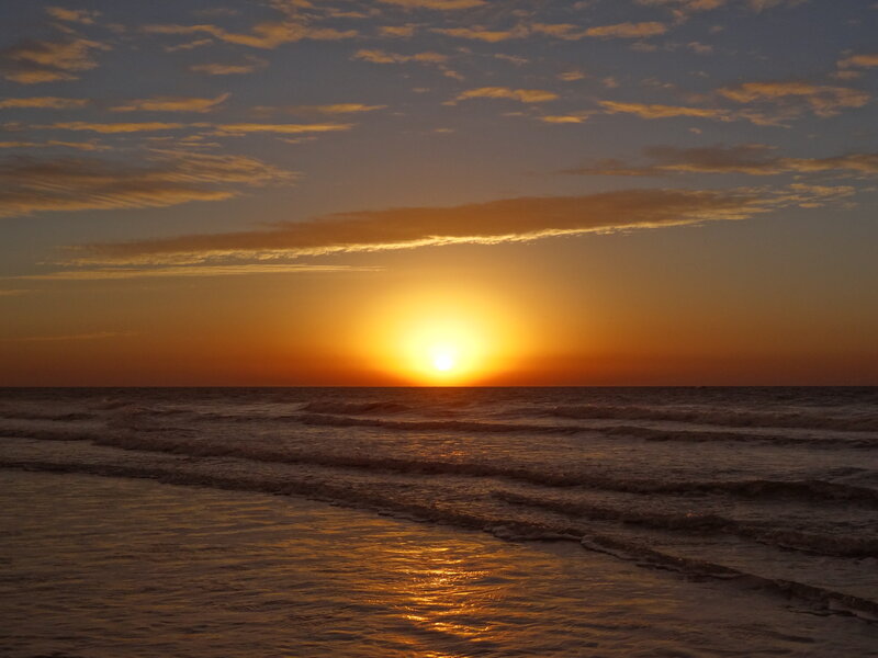 Sun Setting over Ocean — Orange, Serene, Sunset, Photograph, Sky, Clouds, Waves