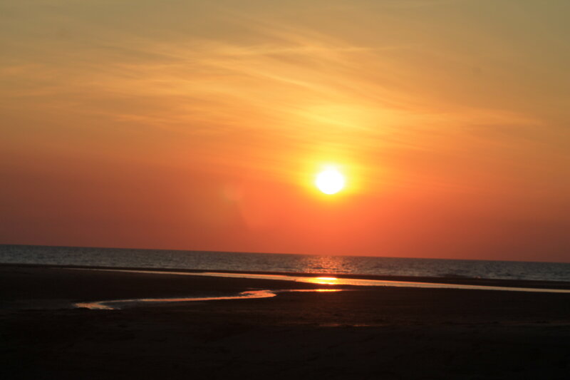Sun Setting over Ocean — Orange, Serene, Sunset, Photograph, Sky, Sand