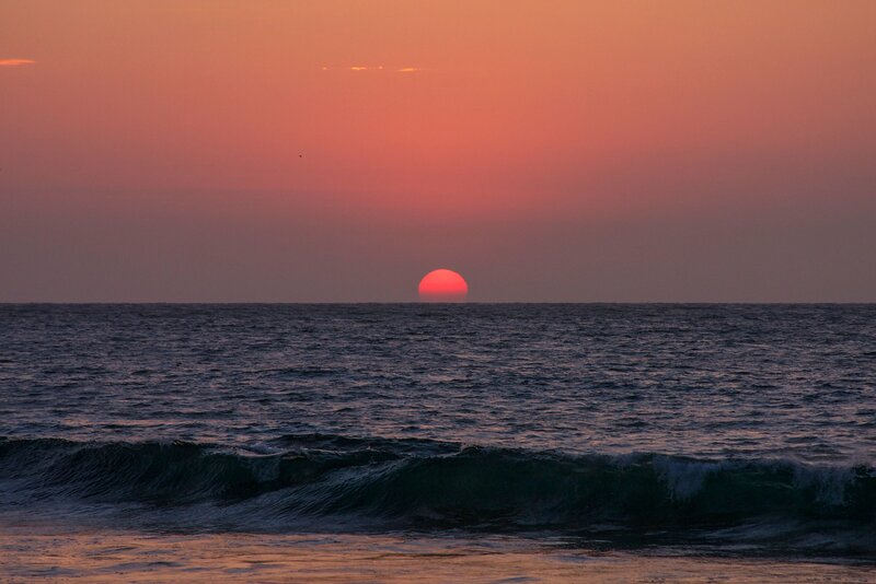 Sun Setting over Ocean — Orange, Serene, Sunset, Photograph, Sky, Wave