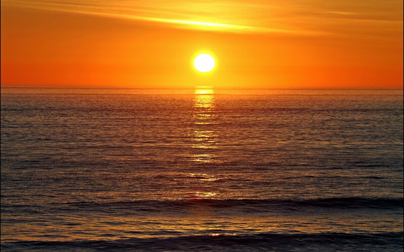 Sun Setting over Ocean — Orange, Serene, Sunset, Photograph, Sky, Yellow, Blue