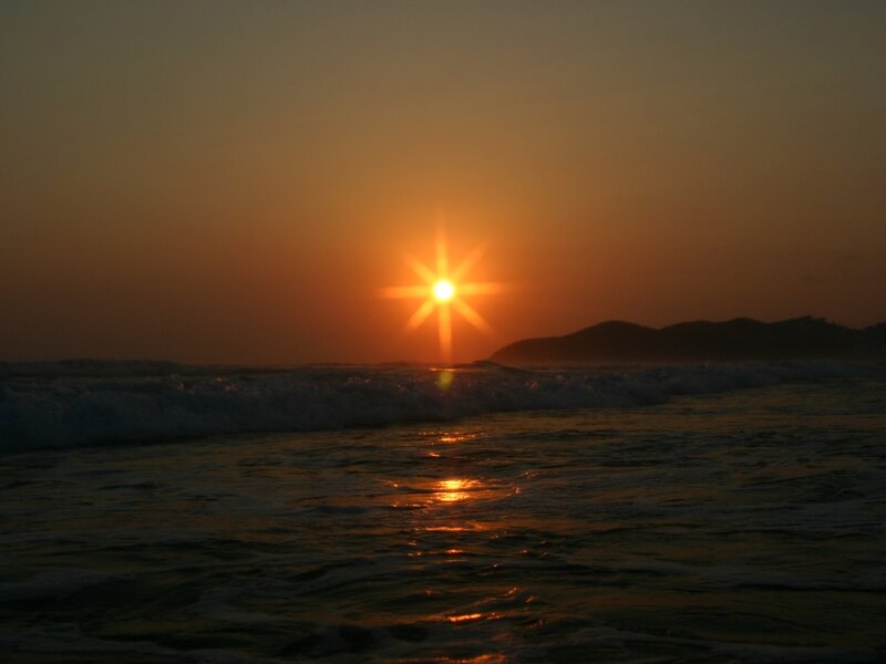 Sun Setting over Ocean — Orange, Serene, Sunset, Photograph, Waves, Mountain