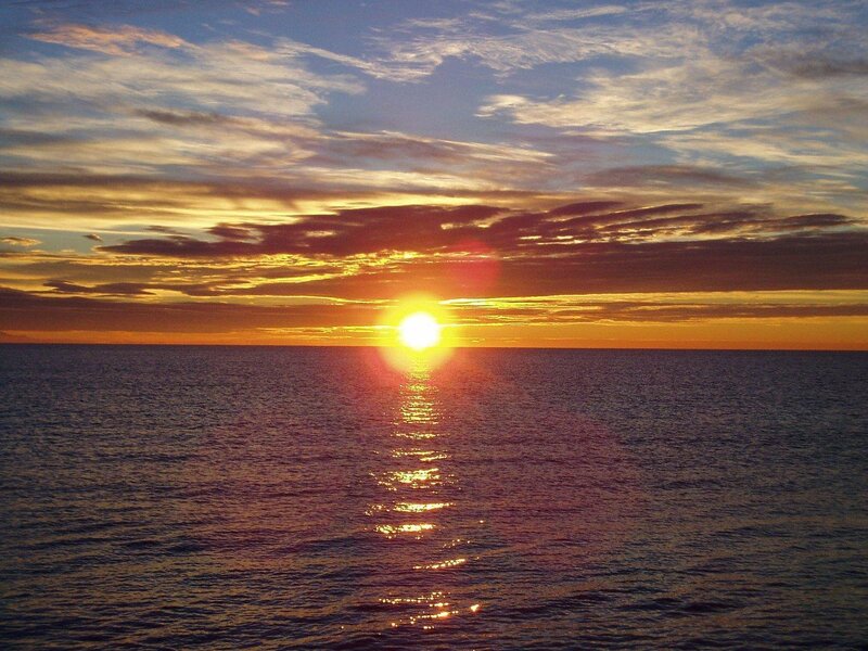 Sun Setting over Ocean — Orange, Serene, Sunset