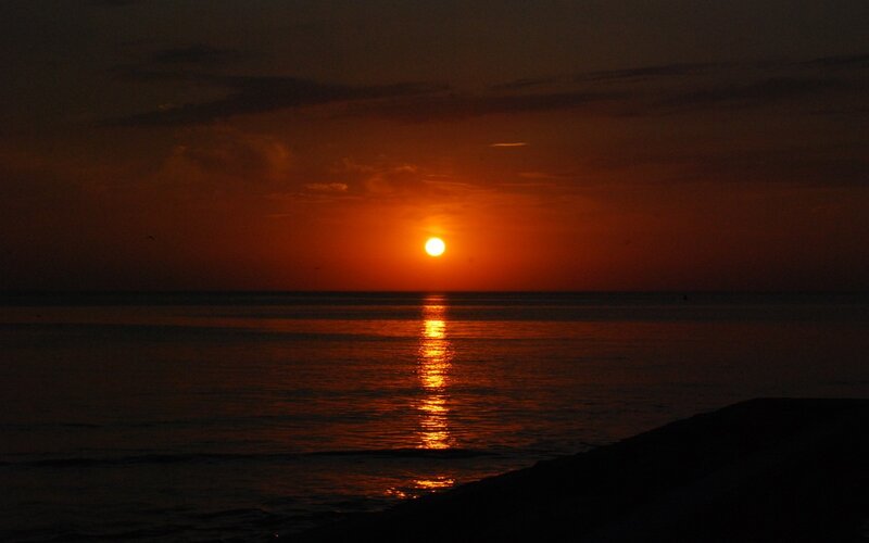 Sun Setting over Ocean — Orange, Sky