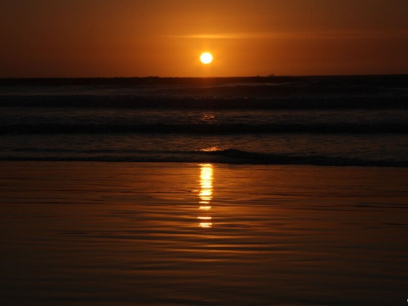 Sun Setting over Ocean — Orange