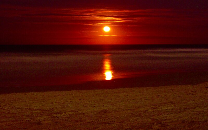 Sun Setting over Ocean — Red, Dramatic, Sunset, Photograph, Beach