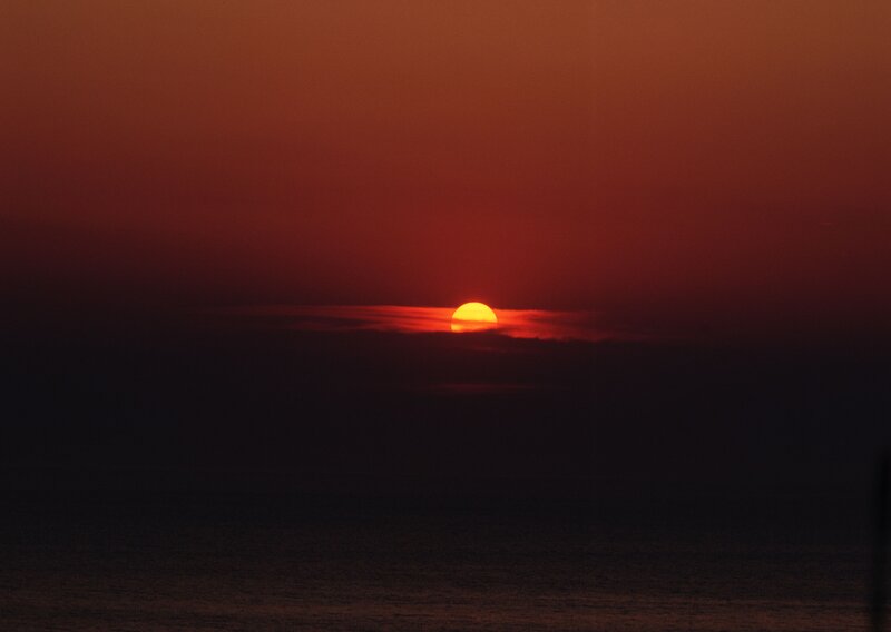 Sun Setting over Ocean — Red, Dramatic, Sunset, Photograph, Clouds, Orange, Black