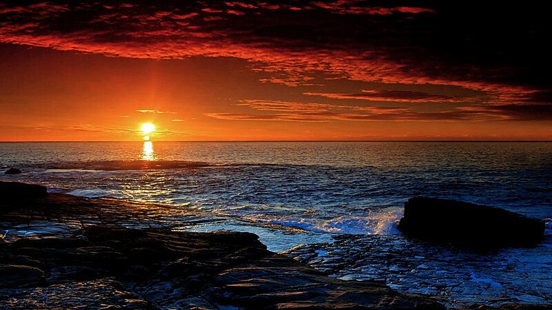 Sun Setting over Ocean — Red, Dramatic, Sunset, Photograph, Rocks