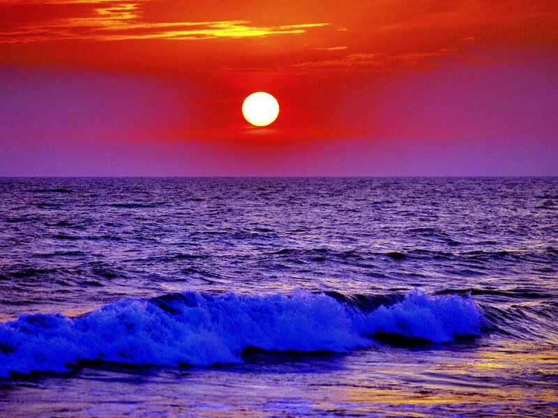 Sun Setting over Ocean — Red, Dramatic, Sunset, Photograph, Waves