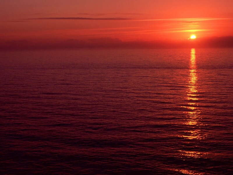 Sun Setting over Ocean — Red, Dramatic, Sunset