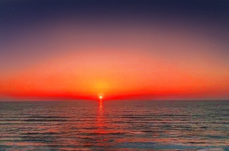 Sun Setting over Ocean — Red, Serene, Sunset