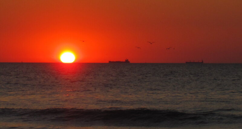 Sun Setting over Ocean — Red, Serene