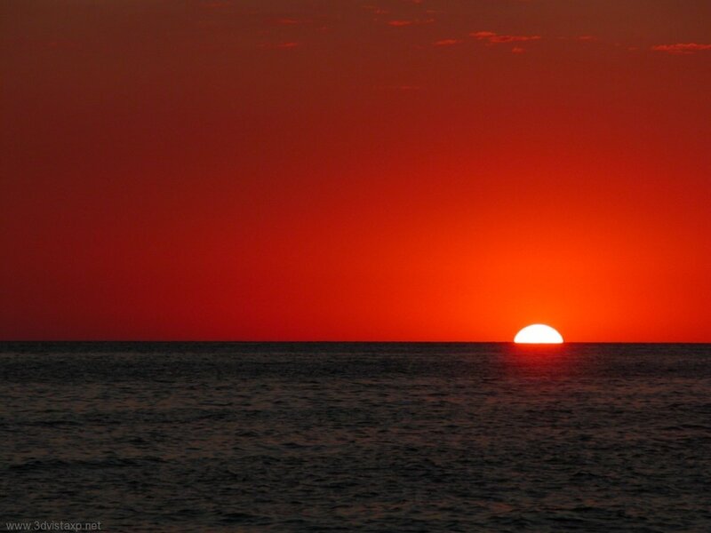 Sun Setting over Ocean — Red, Sky