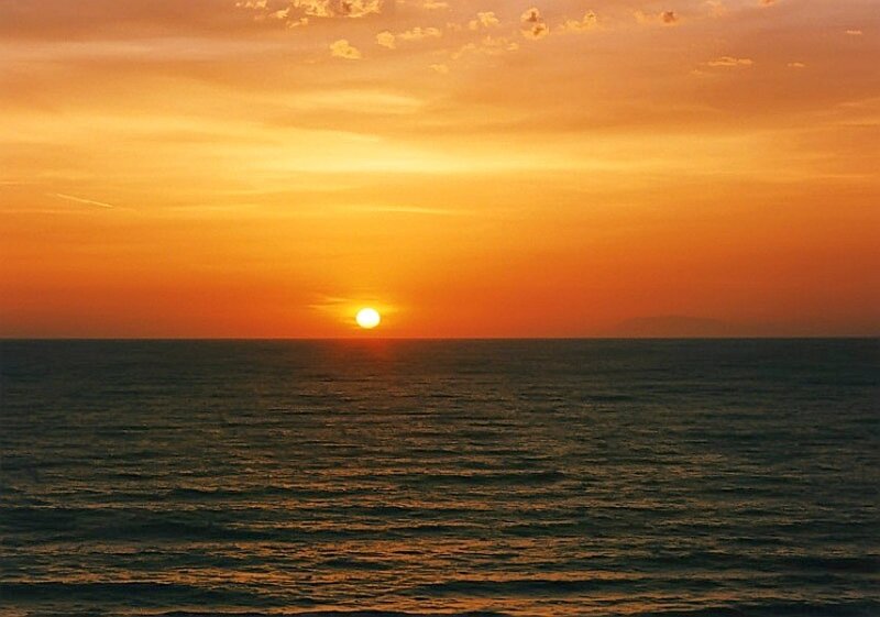 Sun Setting over Ocean — Serene, Blue