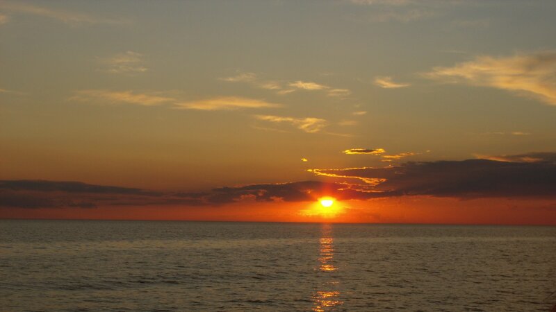 Sun Setting over Ocean — Serene, Photograph