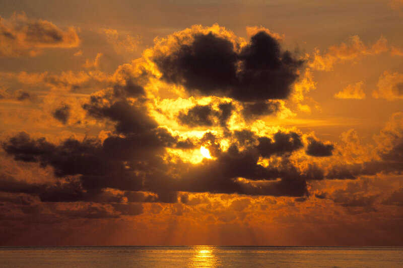 Sun Setting over Ocean — Sunset, Black