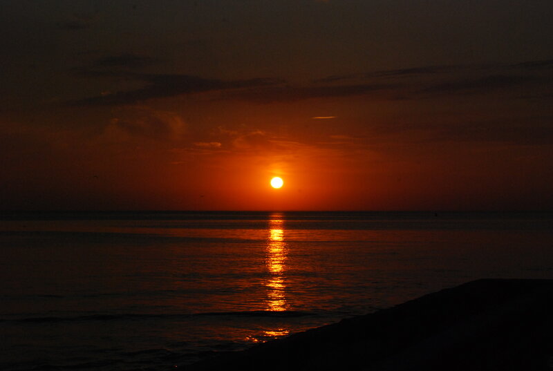 Sun Setting over Ocean — Sunset