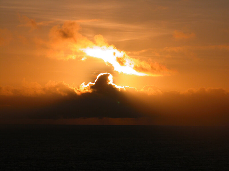 Sun Setting over Ocean — Sunset, Yellow