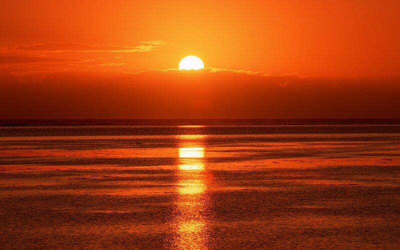 Sun Setting over Ocean — Water
