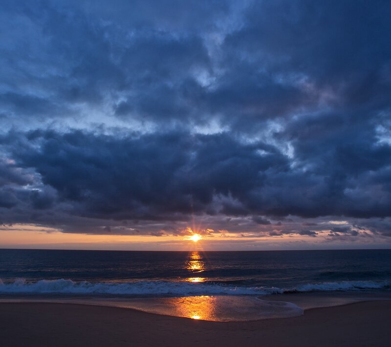 Sun Setting over Ocean — Waves