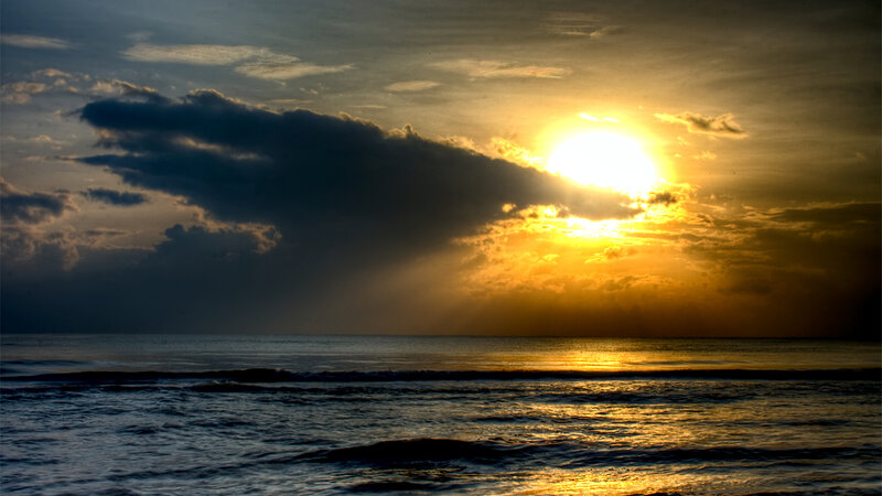 Sun Setting over Ocean — Yellow, Dramatic, Sunset, Photograph, Clouds