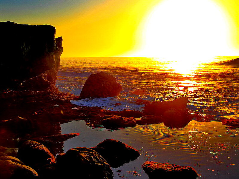 Sun Setting over Ocean — Yellow, Dramatic, Sunset, Photograph, Rocks