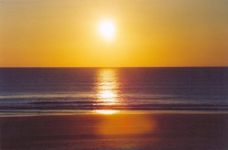 Sun Setting over Ocean — Yellow, Serene, Sunset, Photograph, Beach, Sky, Orange