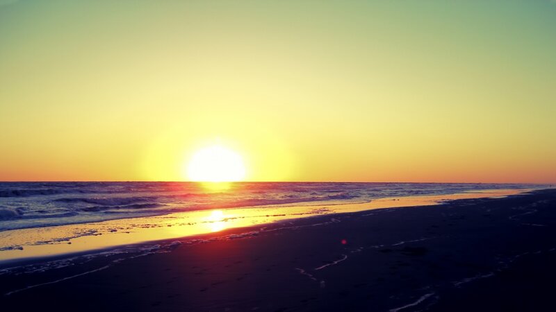 Sun Setting over Ocean — Yellow, Serene, Sunset, Photograph, Beach, Waves, Sky