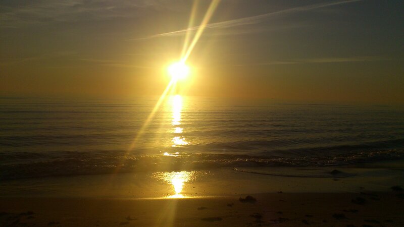 Sun Setting over Ocean — Yellow, Serene, Sunset, Photograph, Beach, Waves