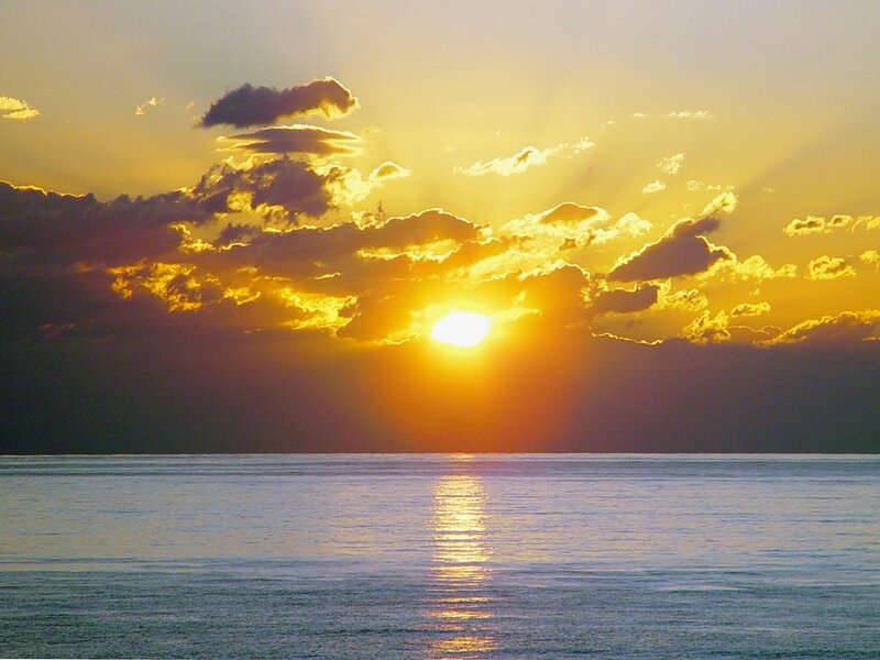 Sun Setting over Ocean — Yellow, Serene, Sunset, Photograph, Clouds, Orange, Blue