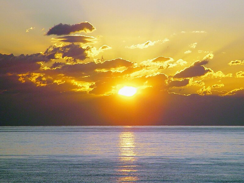 Sun Setting over Ocean — Yellow, Serene, Sunset, Photograph, Clouds, Reflection