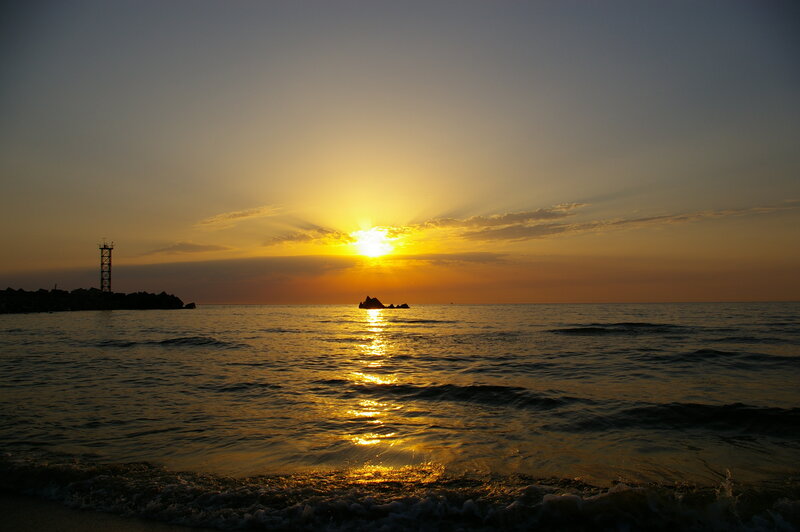 Sun Setting over Ocean — Yellow, Serene, Sunset, Photograph, Lighthouse