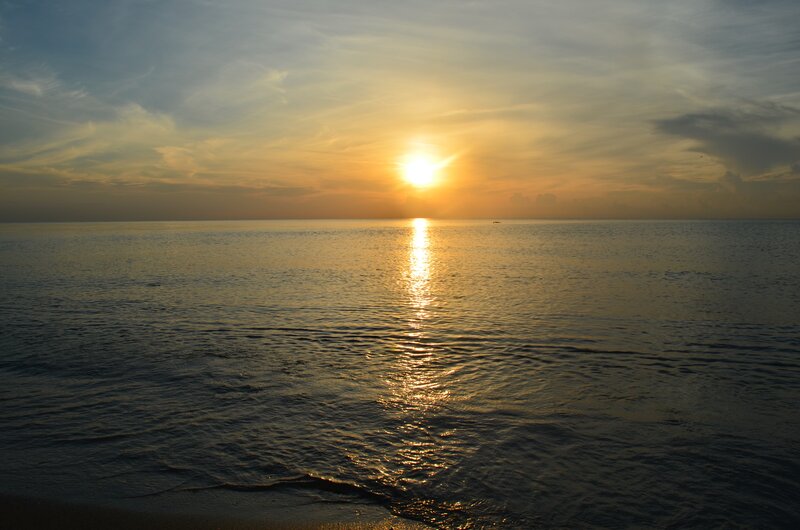 Sun Setting over Ocean — Yellow, Serene, Sunset, Photograph, Sky, Waves