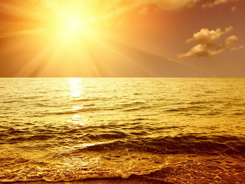 Sun Setting over Ocean — Yellow, Serene