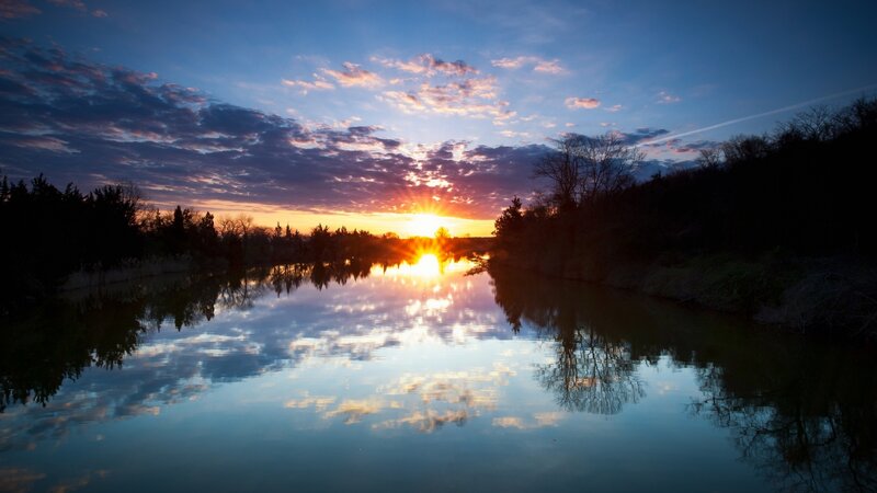 Sun Setting over River — Blue, Serene
